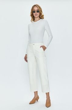 A soft white shade acts as a neutral base for this relaxed pant with utilitarian details. In a modern straight leg fit, the mid rise style has classic carpenter features like front panels and a hammer loop. Can be dressed up with heels or worn casually with sneakers. 98% Cotton / 2% Spandex Imported Soft White, Mid Rise, Vanilla, Straight Leg, Dress Up, Spandex, Heels, Sneakers, Pants