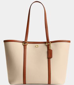 From COACH&#x2C; the Legacy Colorblock Tote Bag features:Polished pebble leatherInside zip pocketSnap closureHandles with an approx. 10 dropApprox.: 11" L x 11" H x 5.5" WImported. Tote Bag Coach, Tote Bags For College, College Tote Bag, Uni Outfit, Uni Bag, Summer Wishlist, Coach Tote Bag, Luxury Tote Bags, Tote Bags For School