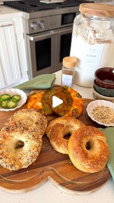 bagels and other food items on a cutting board