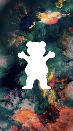 the silhouette of a teddy bear is shown in front of an abstract background with multicolored paint