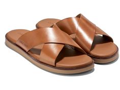 Cole Haan Nantucket Cross Strap Sandals - Men's Sandals : British Tan/Dark Latte : Slip into style and comfort by wearing the Cole Haan Nantucket Cross Strap Sandals. The slip-on style sandals have an open round-toe design, detailing as a beefroll penny keeps with a beautifully stitched moc toe and heel, stitched midsole and leather choices offered all deliver a comfortable wearing experience. The leather upper and lining with EVA insole construction make this pair a perfect pick for everyday we Cross Strap Sandals, Mens Shoes Sandals, Cole Haan Men, Men's Sandals, Toe Designs, Nantucket, Mens Sandals, Cross Straps, Cole Haan