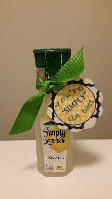 a bottle of simply lemonade with a green bow