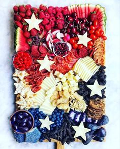 a platter filled with fruits and veggies