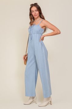 THE PERFECT MIX OF FLIRTY AND FUN, THIS JUMPSUIT IS READY FOR ANY SUMMER OCCASIONS. THE FLOWY SILHOUETTE IS COMPLEMENTED BY A SQUARE NECK LINE, RUCHED BUST, AND FRONT KEYHOLE DETAILS. WHETHER YOU ARE SIPPING COCKTAILS OR DANCING THE NIGHT AWAY, THIS DENIM BLUE JUMPSUIT WILL HAVE YOU FEELING THE BEST.* SLEEVELESS DESIGN* SPAGHETTI STRAP* SELF FRONT TIE* FRONT KEY HOLE* LIGHTWEIGHT MATERIAL* THE MODEL IS 5'9" AND WEARING SIZE SMALLMade In: ChinaFabric Contents: 90% cotton 10% viscoseSize Measureme Jumpsuit Fitted, Blue Jumpsuit, Jumpsuit Summer, Blue Jumpsuits, Sleeveless Jumpsuits, Denim Jumpsuit, Light Denim, Sheer Fabrics, Print Pattern