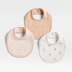 Oh-so-soft and comfy, our set of 100% organic cotton gauze baby bibs puts three adorable designs in one sweet and highly giftable bundle. Including one solid, one striped and one hand-drawn baby animal print, the lightweight, absorbent bibs feature a color scheme of playful pink and ivory. Complete the look with our coordinating Baby's First burp cloths and sheet sets sold separately.   • 100% organic cotton gauze, grown without chemicals or pesticides  • Set includes three bibs  • Soft, absorbe Cute Cotton Bib As Gift, Bunny Fabric, Skin Hand, Baby Animal Prints, Kids Gear, Bib Set, Weaving Process, Pink Mini, Burp Cloths