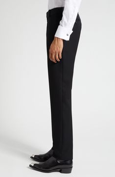 Tailored elegance pervades Italian-crafted trousers fashioned from smooth wool with cleanly pressed creases and a flat front. 34" unhemmed inseam; 14" leg opening; 11 1/2" front rise; 15 1/2" back rise (size 48 EU) Zip fly with hook-and-bar closure 100% wool Dry clean Made in Italy Men's Designer Clothing Tailored Semi-formal Bottoms In Suiting Fabric, Luxury Straight Leg Dress Pants For Evening, Luxury Tapered Leg Dress Pants For Semi-formal Occasions, Luxury Straight Leg Dress Pants For Semi-formal Occasions, Luxury Business Casual Pants With Pressed Crease, Luxury Dress Pants With Concealed Placket, Elegant Fitted Pants With Pressed Crease, Luxury Straight Dress Pants For Evening, Luxury Tailored Suit With Straight Pants