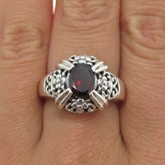 Great vintage condition.  925 Sterling Silver Vintage Real Oval-Cut Red Garnet Floral Blossom Ring Size 8  Weight: 6.0g   WELCOME TO PAWN SHOP We are an actual pawn shop and have been in business for over 25 years. Since 1990, our establishment has been serving a variety of clients by providing them with short term cash solutions and options of liquidity regarding their treasured heirlooms. Acknowledging that today′s customers are very sophisticated and are looking for a variety of investments, Pawn Shop, Red Garnet, 25 Years, Oval Cut, Ring Designs, Garnet, Vintage Jewelry, Jewelry Rings, Blossom