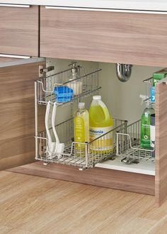 an open dishwasher drawer in a kitchen