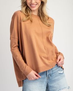 Say hello to your new favorite sweater, Coco! This Round Neck Sweater Top is the perfect combination of cozy and stylish. With its soft fabric and playful design, you'll be feeling confident and comfortable all day long. Say goodbye to boring sweaters and hello to Coco! 50% viscose, 28% polyester, 22% nylon Model is 5'9 and wearing a size small Casual Brown Sweater With Soft Texture, Trendy Knit Top For Fall Layering, Comfy Relaxed Fit Knit Tops, Comfy Knit Tops With Relaxed Fit, Relaxed Fit Comfy Knit Top, Super Soft Comfortable Top For Fall, Comfy Cotton Soft Knit Tops, Comfy Soft Knit Cotton Tops, Oversized Comfy Soft Knit Top