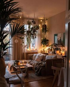 Whether you’re decorating a new apartment or looking to redecorate your existing digs, it’s always a good time to level up your surroundings. Ready to get started? Scroll ahead for 20 creative apartment decorating ideas that will help you beautify your humble abode. #small #living #room #designs Earthy Living Room, Lots Of Plants, Furnitur Ruang Keluarga, Apartment Decoration, Deco Studio, Exterior Home, Apartment Aesthetic