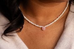 This dainty necklace, featuring freshwater pearls surrounding a rose quartz gemstone, is both unexpected and stylish. It gives off boho vibes with a splash of timelessness. Materials: freshwater pearls, rose quartz teardrop gemstone, 14k gold-filled extender and hardware Dimensions: 14 inches with 3-inch extender This piece is waterproof; if it gets wet, it will not tarnish. What is 14k gold-filled? Waterproof (won’t tarnish) Hypoallergenic (ideal for sensitive skin) Most affordable gold option Delicate Pink Pearl Drop Necklace, Pearl Teardrop Beaded Necklace For Gift, Teardrop Pearl Beaded Necklace For Gifts, Dainty Pink Pearl Necklace With Pearl Drop, Gift Pearl Drop Teardrop Beaded Necklace, Teardrop Pearl Drop Beaded Necklace Gift, Dainty Pearl Necklace With Gemstone Beads For Gift, Dainty Gemstone Beads Pearl Necklace Gift, Dainty Pearl Necklace With Gemstone Beads