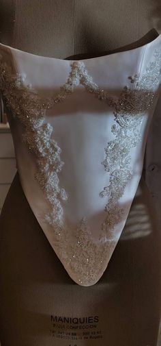 the back of a mannequin's dress on display