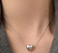 Trendy Sterling Silver Heart Pendant Charm Necklace, Trendy Sterling Silver Charm Necklace With Heart Pendant, Simple Heart Pendant Necklace For Everyday, Simple Everyday Heart Necklace, Simple Everyday Heart-shaped Necklace, Simple Everyday Heart Pendant Necklace, Simple Everyday Necklaces With Heart Shape, Minimalist Necklaces With Heart Pendant, Trendy Heart Pendant Necklace With Delicate Chain