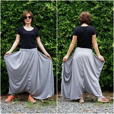 "Boho funky pants or skirt with elastic waist. The pants feature very low crotch, roomy pocket, side flap with button that create a wrap skirt looks! Material: 40% cotton mix 60% polyester jersey, elastic band, button Model is 161 cm. tall with 28\" waist and 38\" hip Measurement: pants (approximately) Elastic waist: 26\"-36\" (no zipper) Hip: 72\" If you wear as shown on the 2nd pic. Hip: 45 \" If you button up as shown on the 3rd pic. Length: 36\" (longest partfrom waist to hem) PLEASE PROVIDE Casual Harem Bottoms With Side Pockets, Baggy High-waist Harem Pants With Elastic Waistband, High-waist Loose Fit Harem Pants With Side Pockets, Versatile Stretch Harem Bottoms, Casual Harem Bottoms With Elastic Waistband, Lagenlook Baggy Pants With Elastic Waistband, Baggy Harem Bottoms With Elastic Waistband, Stretch Harem Bottoms With Elastic Waistband, Fitted Casual Harem Pants With Drop Crotch