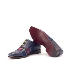 Characterized by its closed lacing style, the oxford is an elegant, classic, timeless style suitable for any occasion. The oxford is a staple shoe in any man’s wardrobe and can be dressed up or down. The Details: Materials: tartan sartorial + navy painted calf Lining: red calf leather Sole: dark red leather sole plain Last: Monti - Classic elegance with slightly square toe The Fine Print: Shoe production timeline/shipping Can vary from 15-30 days from the date of order. All shoes are handmade, s Brown City, Staple Shoes, Custom Design Shoes, Oxford Dress Shoes, Oxford Shoes Men, Oxford Dress, Goodyear Welt, Handmade Shoes, Dark Red