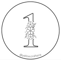 the number one is decorated with flowers and leaves in black on a white circular background