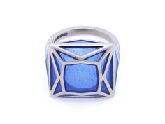 Blue plique-à-jour enamel ring in 18K white gold. Signed SA-P for Solange Azagury-Partridge, with English hallmarks. The retail price is £5800 (approximately $7500). Plique-à-jour is a difficult enameling process in which enamel is applied to an area with no backing instead of onto metal. The result is the enamel is transparent or translucent. Plique A Jour Enamel, Jewellery Marketing, Enamel Ring, Partridge, Custom Jewelry Design, Enamel Jewelry, Gold Design, Necklace Designs, Statement Jewelry