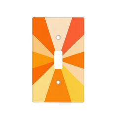 an orange and yellow light switch plate