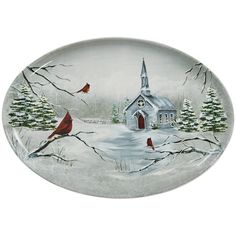 a glass plate with a church and birds on it