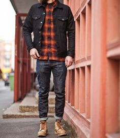 @sel.vage with an awesome rugged double denim look with a plaid rust black plaid flannel black denim jacket raw denim tan moc toe red wing heritage boots #doubledenim #rugged #redwingheritage #redwings #redwing #boots #selvedge #menswear #mensfashion #menstyle #flannel #ruggedmensfashion Redwing Boots, Double Denim Looks, Double Denim, Stylish Mens Outfits, Red Wing