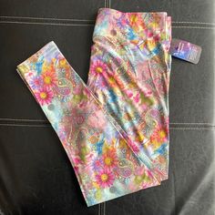 Legging Universe Women’s Buttery Soft Psychedelic Flower Leggings Tc Never Worn Fitted Purple Leggings For Loungewear, Multicolor Elastic Bottoms For Spring, Elastic Multicolor Bottoms For Spring, Spring Elastic Multicolor Bottoms, Spring Multicolor Elastic Bottoms, Purple Full Length Leggings For Loungewear, Printed Fitted Leggings For Spring, Purple Fitted Casual Leggings, Purple Stretch Leggings For Summer