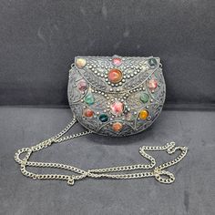 This Is A Vintage Sajai Purse With Natural Agates. In Very Nice Shape! Like New!!! -Brand: Sajai -Color: Metal -Fyi This Is A Small Purse Don't Have Exact Measurements!! Silver Handheld Shoulder Bag For Gift, Silver Pouch Bag For Gift, Bohemian Pouch Evening Bag As Gift, Handmade Multicolor Evening Bags, Bohemian Handheld Bag For Gifts, Handmade Silver Shoulder Bag For Everyday Use, Silver Handmade Shoulder Bag For Everyday Use, Bohemian Handheld Bag For Parties, Handmade Bohemian Silver Bag