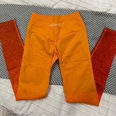 Alphalete Leggings In A Burnt Orange Color In A Size Xs! So Cute And In Perfect Condition. Never Used And No Peeling Orange Fitted Activewear For Loungewear, Orange Stretch Pants For Workout, Stretch Orange Athleisure Pants, Orange Stretch Workout Bottoms, Fitted Orange Workout Bottoms, Fitted Orange Yoga Pants For Gym, Stretch Orange Workout Pants, Orange Stretch Workout Pants, Fitted Orange Yoga Pants For Sports