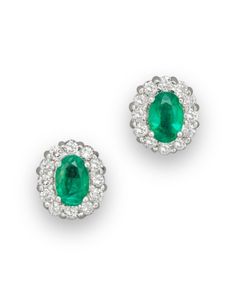 Emerald and diamond oval stud earrings in 14K white gold. Emerald Earring, Oval Jewelry, Oval Stud Earrings, Emerald Earrings Studs, Womens Earrings Studs, Argentium Silver, Exclusive Jewelry, White Gold Earrings, Emerald Earrings