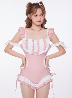 One piece frilly kawaii swimsuit in deep blush-rose, with bow accent, ruffles, white ribbon details at the shoulders, hollow up at the sides, ruffled shoulder straps and tie up bow at the back. Perfect for lake picnics, midnight swim, the beach, oceanfront boardwalk, cruise, pool party, resort weekends, sunbathing in your backyard Swimsuit size conversion US/EU Size XS = Asian Size M swimsuit US/EU size S = Asian Size L swimsuitUS/EU size M = Asian Size XL swimsuit Cute Fitted Ruffle Swimwear, Cute Fitted Ruffled Swimwear, Ruffled One-piece Swimming Suit, Ruffled One-piece Swimsuit, Pink Ruffled Summer One-piece, White Ruffled One-piece Swimsuit, Pink Ruffled Swimwear For Beach, Pink Ruffled Swimwear For Beachwear, Pink Ruffled One-piece Swimsuit For The Beach