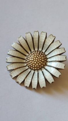 Beautiful vintage daisy silver brooch with white enamel 33mm, Anthon Michelsen by Denmark desinger. Antique White Brooches As Gift, White Antique Brooches As A Gift, White Retro Style Brooch For Gift, White Retro Brooch For Gift, White Enamel Brooches As Gifts, Retro White Brooches As Gift, White Retro Brooches As Gift, White Enamel Brooch Jewelry, White Vintage Brooch Lapel Pin