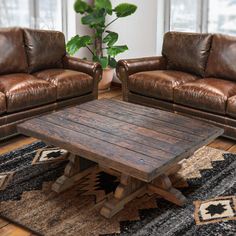 a living room with two couches and a coffee table