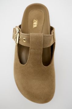 BUCKLED SUEDE CLOGS - Brown | ZARA United States Suede Slip-on Mules With Buckle Closure, Spring Suede Lined Closed Toe Clogs, Suede Closed Toe Sandals For Work, Spring Closed Toe Clogs With Suede Lining, Closed Toe Suede Clogs With Buckle Closure, Suede Closed Toe Clogs With Buckle Closure, Casual Low Heel Mules With Buckle, Casual Low Heel Mules With Buckle Closure, Suede Clogs With Leather Sole For Work