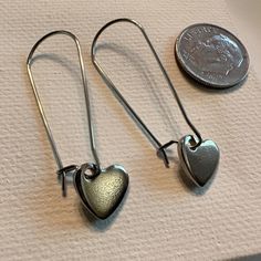 Stainless Heart Earrings Stainless Steel Heart 10mm 1 1/2”” Inch Length Handcrafted By Pixie Life Simple Elegant Casual Bundle Discount Pretty Packaging #245 Aesthetic Artsy Eclectic Streetwear Style Art Design Handcrafted Handmade Jewelry Earrings Elegant Minimalist Chic Boho Bohemian Hearts Silvery Gray Trendy Hipster Millennial Work Essentials Trending New School Style Casual Gift Gifts Girl Unique Fall Spring Summer Vacation Memories Winter Artisan Steel Stainless Hypoallergenic Dangle Silver Nickel-free Hoop Earrings For Valentine's Day, Nickel-free Open Heart Metal Earrings, Silver Minimalist Heart Charm Earrings, Silver Minimalist Heart Earrings With Charm, Silver Minimalist Heart Dangle Earrings, Minimalist Silver Heart Cut Earrings, Silver Minimalist Heart Earrings, Metal Earrings For Valentine's Day, Nickel Free Double Heart Silver Earrings