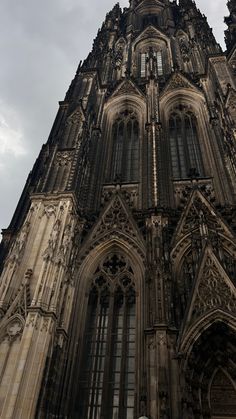 the top of an old building with many windows