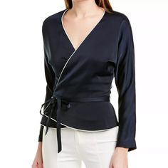 Design Details: Hammered Satin Design, Piped Trim Self-Tie Wrap Closure 100% Polyester Dry Clean Only Spring Season Formal Wrap Blouse, Spring Formal Wrap Blouse, Elegant Blouse With Tie Waist For Brunch, Formal Wrap Blouse, Elegant Wrap Top With Tie Waist, Elegant Wrap Blouse For Work, Elegant Wrap Top For Spring, Elegant Spring Blouse With Tie Waist, Elegant Fitted Top With Tie Waist