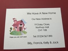 a close up of a business card with a house on it