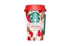 starbucks's strawberry flavored coffee cup with strawberries on the side and red lid