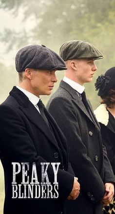 three men in coats and hats standing next to each other with the words peaky blinders on them