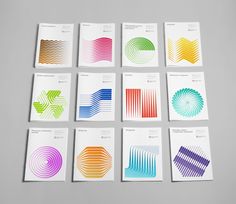 six booklets with different colored lines on them