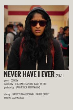 a woman wearing sunglasses and a hoodie with the words never have i ever on it