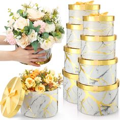 a bunch of flowers that are in some kind of box with gold trimmings