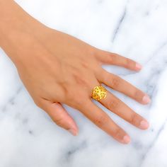 Fashioned from 22k yellow gold and weighing 3.3 grams, this trendy ring showcases a decorative design that captures contemporary elegance. Available in size 6.25 with options for resizing, it offers versatility and style. Perfect for those who appreciate modern design with classic gold luxury, this ring adds a fashionable touch to any jewelry collection, enhancing everyday looks with its distinct charm. Product Details Gold Purity(karat): 22k Gold Weight(grams): 3.3 Item Finish: Yellow Gold Ring Size: ﻿6.25﻿ Ring Sizing Available: Yes // 22k Gold Rings For Gift, 22k Gold Fine Jewelry Rings For Gift, Fine Jewelry 22k Gold Rings For Gift, Elegant 22k Yellow Gold Rings, Elegant 22k Gold Ring With Polished Finish, Formal 22k Gold Rings Fine Jewelry, Fine Jewelry 22k Gold Ring For Formal Occasions, Luxury 22k Gold Round Ring, Elegant 22k Gold Rings For Gift