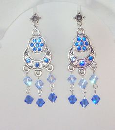 Hey, I found this really awesome Etsy listing at https://www.etsy.com/listing/103674874/swarovski-crystal-chandelier-earrings Blue Jeweled Dangle Crystal Earrings, Blue Cubic Zirconia Dangle Chandelier Earrings, Blue Cubic Zirconia Chandelier Earrings, Nickel Free Blue Crystal Earrings, Elegant Blue Crystal Chandelier Earrings, Elegant Blue Nickel-free Chandelier Earrings, Blue Sterling Silver Nickel-free Chandelier Earrings, Swarovski Crystal Chandelier, Crystal Chandelier Earrings