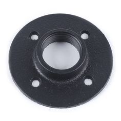 an black metal flange with holes in the center