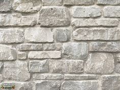 an image of a stone wall that looks like it is made out of bricks