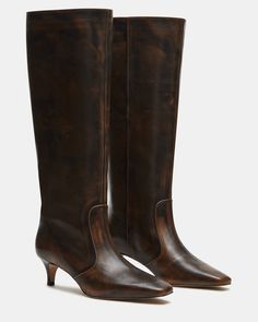 Upgrade your boot game with the LANDER boots. These boots have a square toe, knee-high length, and a trendy kitten heel and elevate any outfit while providing comfort and support. Perfect for everyday wear or dressing up for a night out. 2 inch heel height 14.75 inch shaft circumference 15.25 inch shaft height Leather upper material Textile and synthetic lining Synthetic sock Synthetic sole Imported Fitted Knee-high Boots With Stacked Heel And Almond Toe, Fitted Low Heel Boots With Reinforced Heel, Wide Calf Low Heel Knee-high Boots For Work, Wide Calf Knee-high Boots With Low Heel For Work, Fitted Boots With Low Stacked Heel, Fitted Boots With Sculpted Low Heel, Wide Calf Low Heel Boots With Reinforced Heel, Fall Knee-high Boots With Stacked Heel, Fall Wide Calf Mid-calf Boots With Sculpted Heel