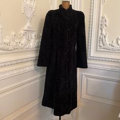 Gorgeous Vintage Black Wool Coat, Persian Lamb Design. Princess Style. 46 Inches In Length, Chest Measures 18 Inches Across, Waist Measures 17 Inches Across Sleeves Measured 24 Inches. Flares At The Base. Made In Usa. Probably 1950s. Excellent Condition. Very Warm. Persian Lamb Coat, Vintage Black Outerwear With Stand Collar, Fitted Vintage Black Outerwear, Vintage Black Fitted Outerwear, Elegant Black Long Coat, Black Outerwear For Evening In Fall, Black Evening Outerwear With Buttons, Black Evening Outerwear For Fall, Elegant Black Outerwear With Button Closure