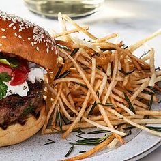 a hamburger and french fries on a plate