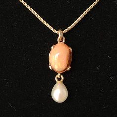 14 Karat Gold Yellow Necklace With Mexican Fire Opal And Pearl Pendant. Pendant Is 20 Mm Long, Opal Is 7 X 10 Mm, Pearl Is 4 X 6 Mm. Chain Is 16 Inches. 3 Grams. Vintage. Excellent Condition. Smoke-Free Home. Not A Posh Member? Enter My Referral Code Dnsesq1 When You Join And Receive A $10 Credit. Vintage Yellow Gold Pearl Necklace Gift, Orange Gemstone Vintage Necklace, Vintage Yellow Gold Pearl Pendant Necklace, Vintage Orange Metal Necklaces, Vintage Orange Metal Necklace, 16 Inch Necklace, Yellow Necklace, Orange Gold, Pearl Pendant