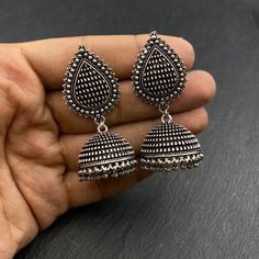 Indian oxidised jhumka earrings Oxidized Silver stud Bollywood jewelry silver hippie jewelry handmade earrings kurti    These stylish Earrings from Quirky Fashions will certainly leave you spellbound. These Earrings have an excellent finish and gives out an exquisite sense of style. If you are looking for an amazing Fashion Jewelry for special occasions such as Anniversary, Engagement, Party, Wedding or for gifting, then your search ends here. The look is stunning and preciously suitable for all Fusion Style Oxidized Jhumkas For Diwali, Silver Jhumkas For Festival, Fusion Style Silver Danglers With Oxidized Finish, Temple Jewelry Style Danglers With Oxidized Finish For Festival, Oxidized Jhumkas, Fusion Oxidized Danglers For Diwali, Silver Fusion Danglers With Oxidized Finish, Temple Jewelry Earrings For Diwali With Oxidized Finish, Bohemian Silver Jhumkas For Festivals